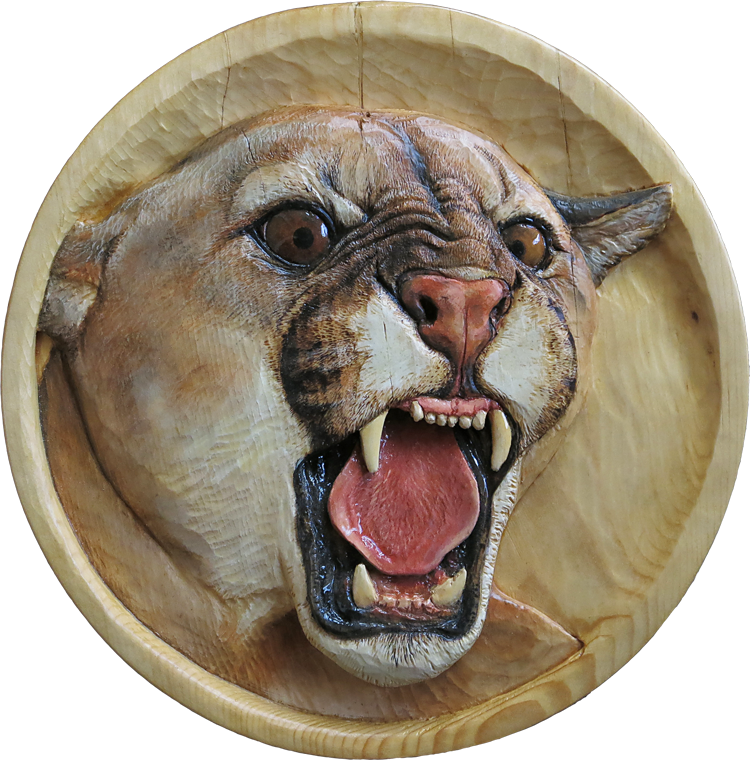 pine relief carving of cougar