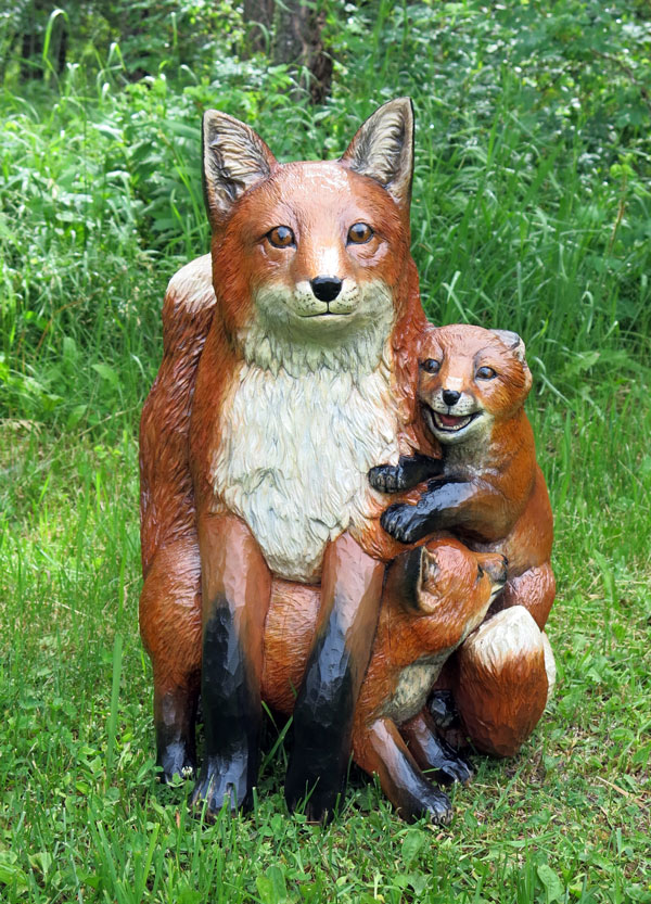 fox mom and two cubs