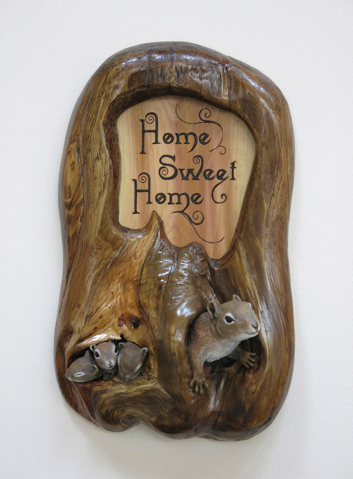 Squirrel mother and three babies den