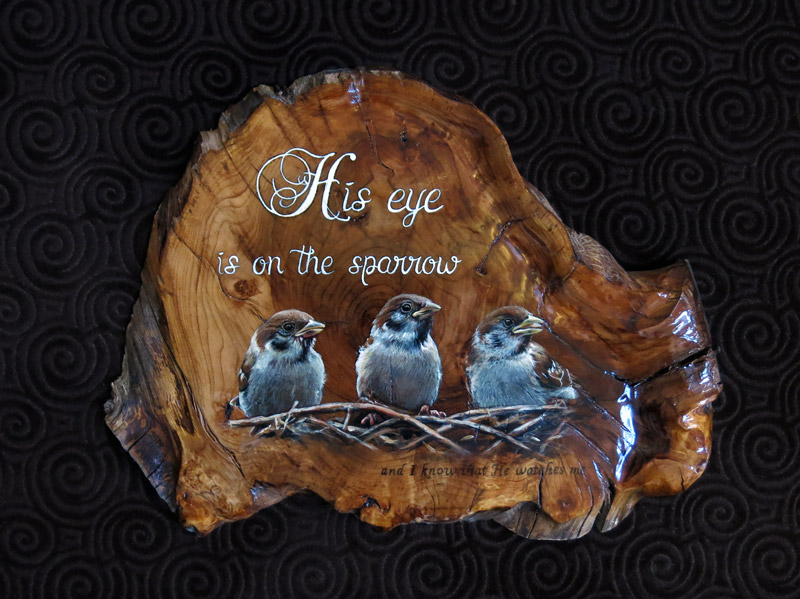 Three sparrows painted on applewood plaque