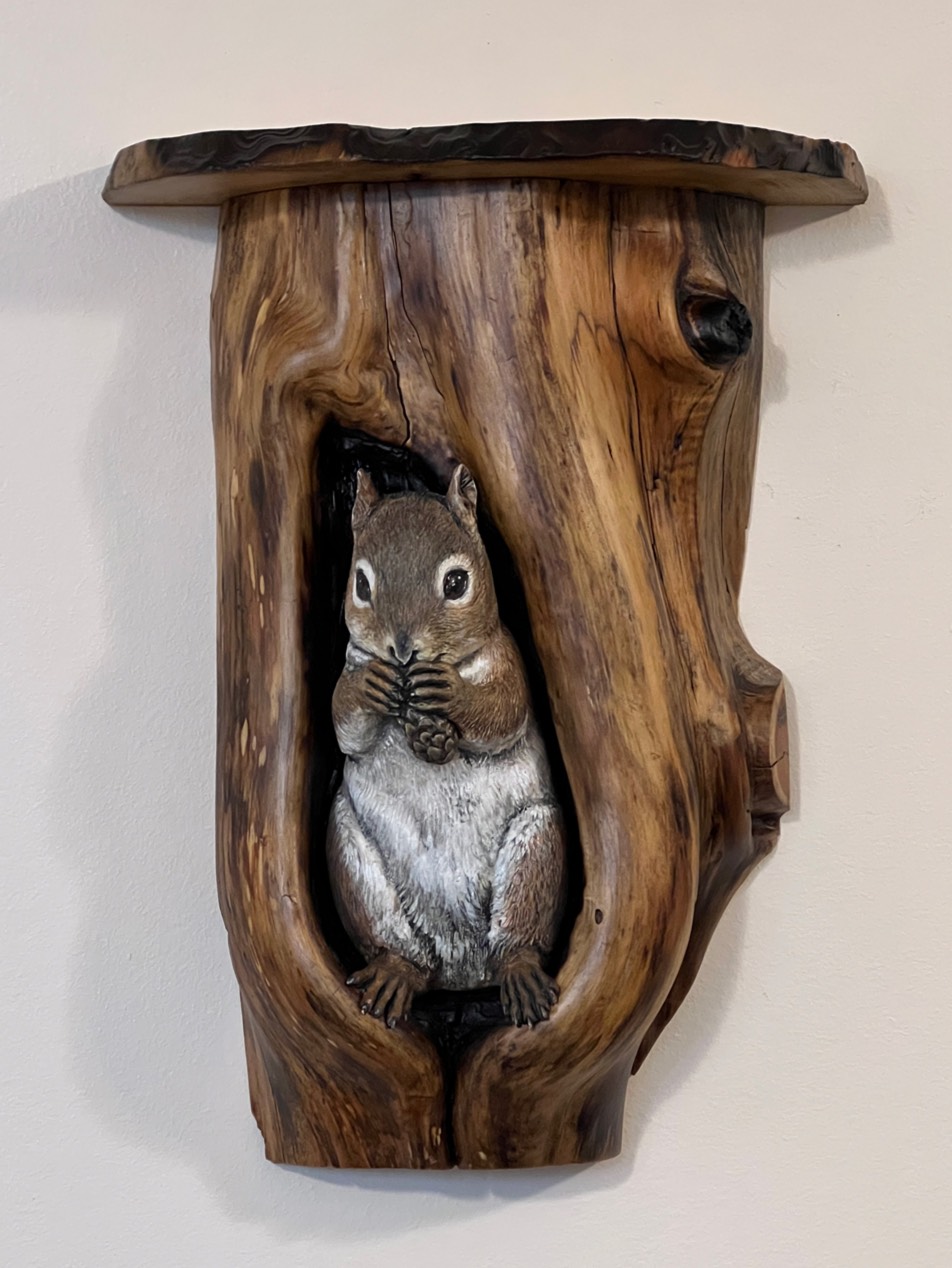 squirrel carving in cedar den frame