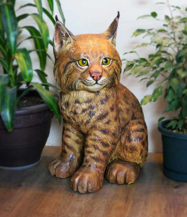 life-size cedar bobcat